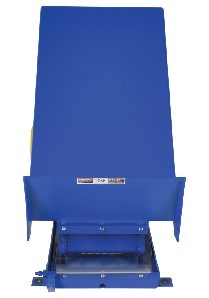 UNI-2448-2-BLU-230-1_A.jpg The Vestil Lift Table 2K 24X48 in blue features an industrial design, large funnel-like structure, 230V 1 Phase power, and front warning labels. It stands securely on a metal base, efficiently handling or processing materials.
