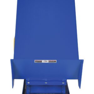 A blue industrial hopper, similar to the Vestil Lift Table 2K 24X48 Blue 460V 3 Phase, has a rectangular shape with a slanted top and front warning labels. It sits on a metal base for material feeding. The white background highlights its robust build and efficient operation.