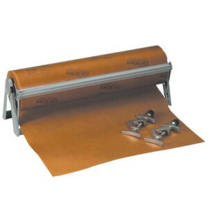 A roll of MH-USA 40 X 48 VCI Paper 35 lb. sheets (200/Case) sits on a metal dispenser, partially unrolled with two metal clips with black handles holding it, revealing packaging text beneath.