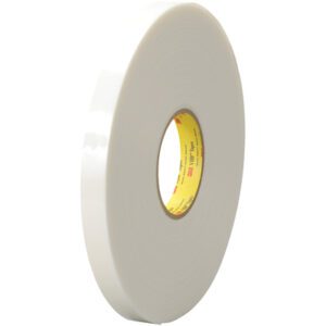 A large 3/4 x 5 yds. white adhesive tape with a yellow inner core, standing upright on a plain background; this sturdy 3M™ 4622 VHB™ Tape is ideal for reliable bonding needs and is packaged as 1 PER CASE.