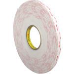 The 1/2 x 5 yds. white 3M™ 4952 VHB™ tape comes on a cardboard core with red text and additional product info, packaged as one roll per case.