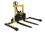 The Vestil Stacker Manual Pump, yellow and black with extended striped forks, safely moves and lifts up to 2000 lbs. Designed for maneuverability, it features a steering handle and two wheels for easy mobility.