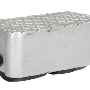 A silver metal foot pedal, similar to the durable Vestil Cast Aluminum Dolly 3000 Lb 8.5L X 4.75W, features a textured grip surface and a round black side knob. Its angled base with two visible black rollers ensures smooth maneuverability for up to 3000 lb loads.