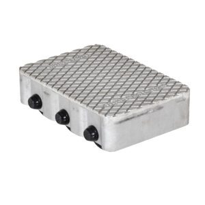 The Vestil Cast Aluminum Dolly 9000 Lb 12.5L X 8.5W features a metallic, diamond-patterned surface with three round black knobs on one side, reflecting light and highlighting its textured design and impressive strength up to 9000 lb capacity.