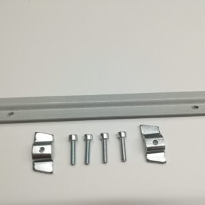Metal rail with two holes, four metal bolts, and two clamp brackets on a flat white surface.
