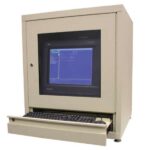 A vintage beige computer workstation with a Vulcan VI TABLETOP CABINET TX GRY houses a large blue-screen monitor and a pull-out tray with a black keyboard, exuding retro charm while maintaining the cabinets classic design.