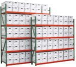 Metal shelving units filled with white cardboard storage boxes. The shelves are organized in two sections, with each having multiple rows stacked vertically. Each box has a handle cutout for easy access.