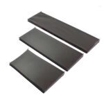 Three elongated, rectangular black trays of varying sizes, similar in design to the Vulcan SP SHELF 24 X 12 BLACK, are aligned parallel against a plain white background with the smallest on top and the largest at the bottom.
