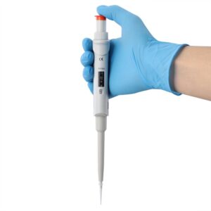 A hand wearing a blue glove holds a white adjustable pipette with precision, its digital display showing measurement settings. Pointed downward, it suggests readiness for use in a laboratory setting, emphasizing the importance of pipette calibration for accurate results.