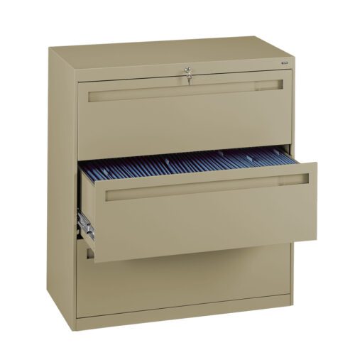 A beige metal filing cabinet with two sliding drawers, one of which is partially open showing hanging blue file folders inside. The cabinet has a lock on the top drawer.