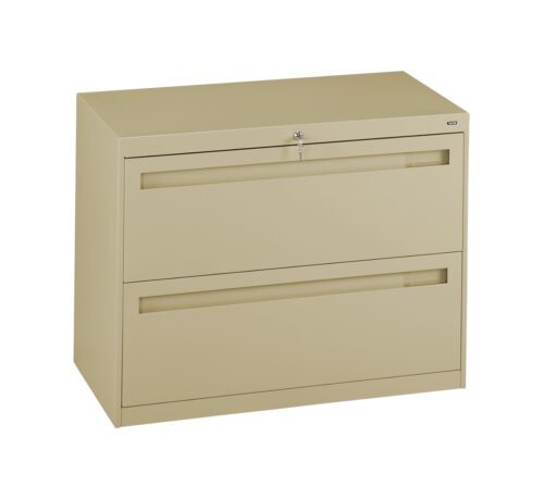 A beige metal filing cabinet with two horizontal drawers. The top drawer has a lock with a keyhole, and the cabinet has a minimalist design. The surface is smooth and unadorned.