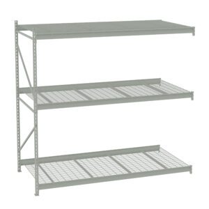 Metal shelving unit with four tiers, including three grated shelves and one solid top shelf. The structure has a light gray finish and is designed for industrial or garage storage. The unit has a minimalist and utilitarian design.