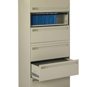 A beige metal filing cabinet with five drawers, partially open. The second drawer is slightly open, revealing a row of blue file folders. The fifth drawer at the bottom is pulled out completely. The cabinet is against a plain background.