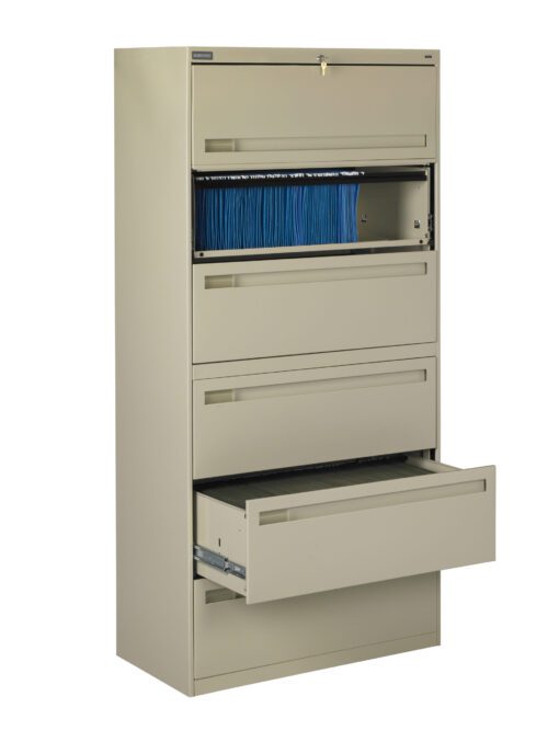 A beige metal filing cabinet with five drawers, partially open. The second drawer is slightly open, revealing a row of blue file folders. The fifth drawer at the bottom is pulled out completely. The cabinet is against a plain background.