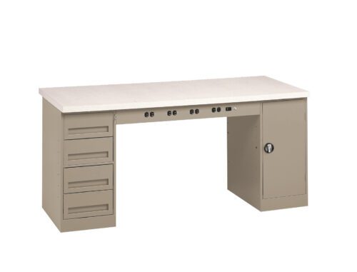 A beige industrial workbench with a white tabletop, featuring four drawers on the left, a cupboard with a handle on the right, and electrical outlets in the front center.