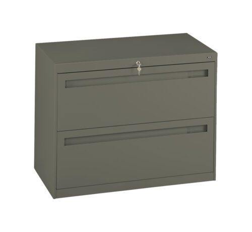 A gray, two-drawer lateral filing cabinet with a lock and key on the top drawer. The cabinet has a clean, modern design with handles integrated into each drawer.