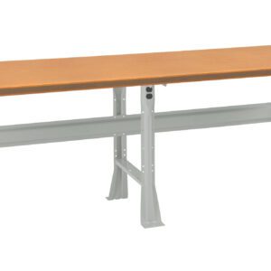 A long, rectangular workbench with a light brown wooden top and sturdy gray metal legs. The design includes a crossbar for added stability. The bench is suitable for various tasks and environments.