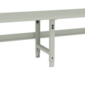 A long, light gray, metal workbench with a flat top and sturdy, adjustable legs. The design is simple and industrial, suitable for heavy-duty use in workshops or garages.