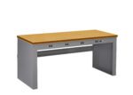 A rectangular workbench with a wooden top and a gray metal frame, featuring multiple electrical outlets along the front edge.