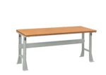 A sturdy workbench with a wooden top and metal legs is set against a white background. The tabletop is smooth and rectangular, while the metallic legs are robust and feature supportive crossbars for added stability.