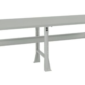 A long, sturdy metal workbench with a flat grey surface and support beams underneath. It features adjustable legs for stability, designed for industrial or workshop use.