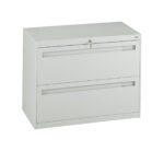 A white, metal filing cabinet with two drawers and a small lock at the top. The cabinet has a minimalist design, with horizontal handles integrated into each drawer.