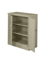 An open metal storage cabinet with two doors, featuring two adjustable shelves inside. The cabinet is light gray in color and has locking handles on each door. The design is industrial and functional, suitable for office or workshop use.