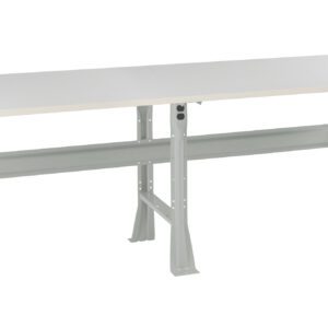 A long, rectangular white table with a sturdy, light gray metal frame and four angled legs. The design is simple and functional, suitable for various purposes like workspaces or utility areas.