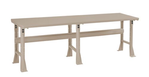 A long, beige workbench with metallic construction and sturdy legs. The bench has a rectangular top and is supported by two U-shaped legs on each side, featuring a reinforced bar underneath for stability. The design is simple and functional.