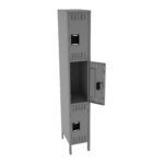 A tall, gray metal locker with three compartments, featuring small vents on each door. The middle door is open, showing a spacious interior. Each door has a handle and a label holder. The locker stands on four short legs.