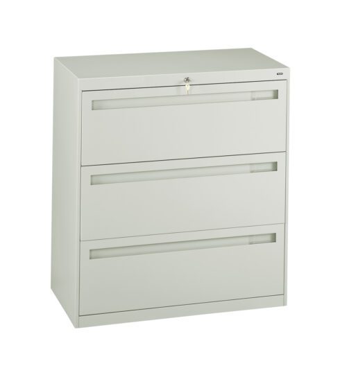 Metallic gray filing cabinet with three horizontal drawers. A lock is visible at the top center, with a key inserted. The cabinet stands on a flat surface against a plain white background.