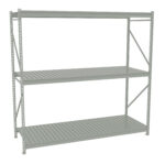 A metal shelving unit with three tiers. The structure is gray, featuring vertical supports and horizontal slatted shelves. The design is simple and functional, suitable for storage and organizing items in various settings.