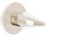 A minimalist beige wall hook mounted on a white surface, featuring a circular base and a slightly pointed end for hanging items.