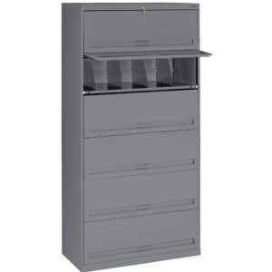 A tall, gray metal filing cabinet with multiple drawers, one of which is open revealing interior compartments. The cabinet features a lock at the top for security.