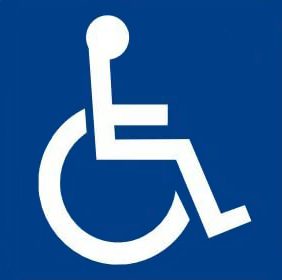 A white wheelchair symbol on a blue background, representing accessibility for individuals with disabilities.