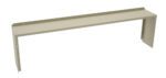 A beige metal shelf bracket with a long, rectangular shape and angled edges, designed to support or hold a shelf. It has several pre-drilled holes for mounting.