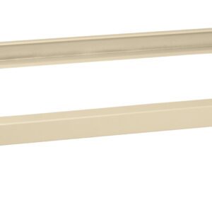 A beige rectangular metal dolly with four black swivel caster wheels. The frame is designed for transporting rectangular items, providing stability and mobility. A small red label is visible on one side of the frame.