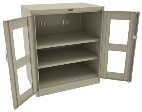 A beige metal cabinet with two open doors revealing three empty shelves inside. The doors have vertical glass panels and there is a lock mechanism on the right door. The interior is simple and unadorned.
