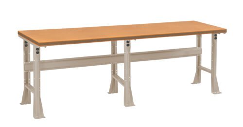 A long, industrial-style workbench featuring a wooden tabletop and sturdy, adjustable metal legs in a neutral color. The design is simple and functional, suitable for various workshop or garage environments.