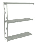 A gray, metal shelving unit with three horizontal shelves and a vertical support structure on the left side. The shelves have slatted surfaces and the design is minimalist, suitable for storage or display purposes.