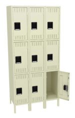 A set of beige metal lockers arranged in a 3x3 grid. Each locker has a small black handle. The bottom right locker door is open, revealing an empty compartment inside.