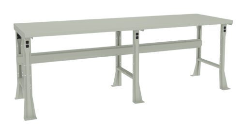A minimalist beige table with a rectangular top and sturdy metal legs and rails designed for industrial or workshop use. The table has a simple and functional design suitable for various tasks.