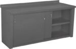 Gray metal workbench with two sliding doors on the front. One door is closed, while the other reveals open shelving with two compartments. There is a flat surface on top and a small raised edge along the back.