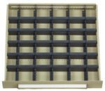 An empty, light gray metal drawer with multiple dividers creating a grid of square compartments. The dividers are dark gray and evenly spaced, organized in four rows and six columns. The image is viewed from above.