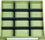 Empty industrial shelving unit with beige frame and six horizontal black shelves. The back panel has a light brown color, and there is a white horizontal bar at the bottom of the frame.
