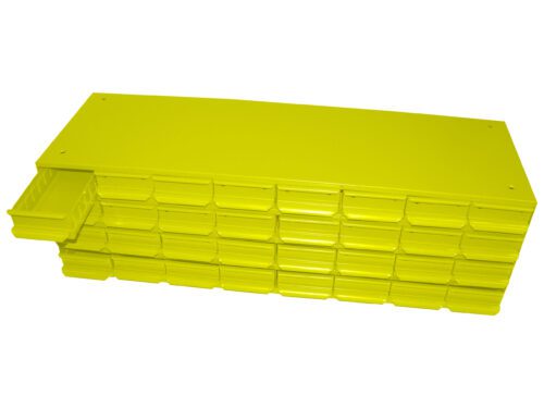 Yellow organizer cabinet with multiple small drawers, arranged in a grid pattern. One drawer is slightly pulled out, revealing storage space inside. The organizer is placed against a plain white background.