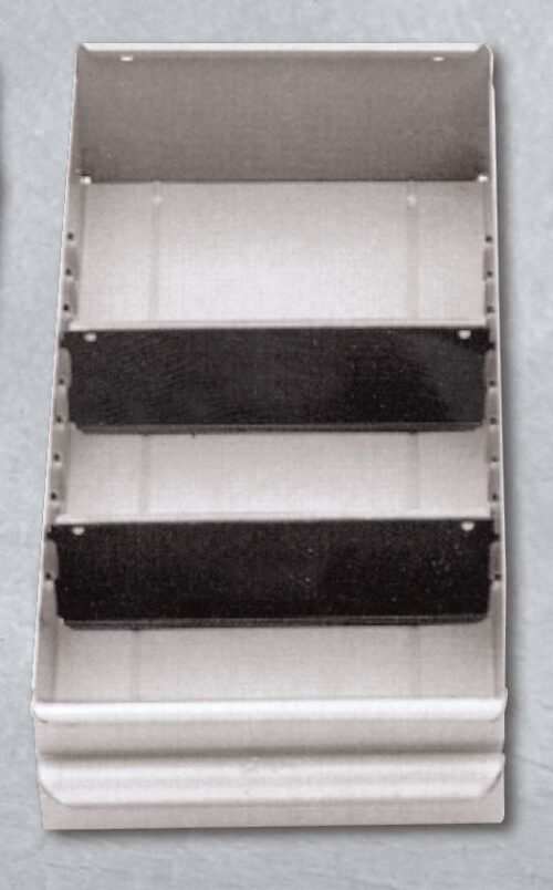 A three-tiered, wall-mounted metal shelf with two black dividers separating the compartments. The shelves are grey, and the unit appears industrial, likely used for organizing tools or materials. Its set against a plain background.