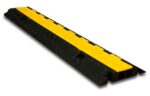Meet the TCT 2 - Channel Light Duty Cable Protector: a black-and-yellow, elongated design with a textured surface that shields cables and reduces tripping risks. It features a central yellow strip framed by durable black sections for enhanced safety.