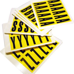 A stack of MH-USA Complete Packs of Self-Adhesive Letters, size H.0.83 in x W.2.2 in, features large black letters like A, B, S, Y, and Z on yellow cards, fanned to show multiple copies of each character.