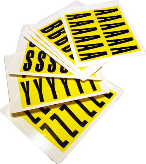 A stack of MH-USA Complete Packs of Self-Adhesive Letters, size H.0.83 in x W.2.2 in, features large black letters like A, B, S, Y, and Z on yellow cards, fanned to show multiple copies of each character.